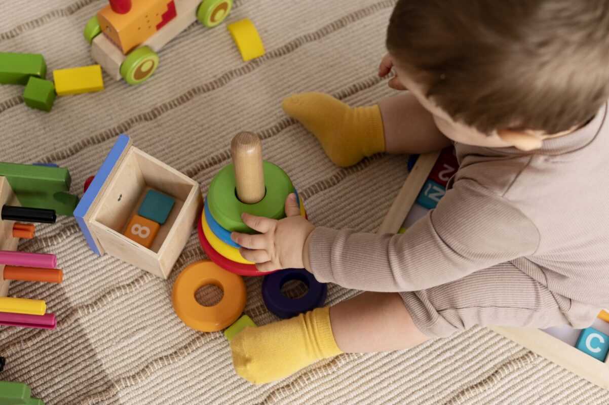 Kid playing with toys