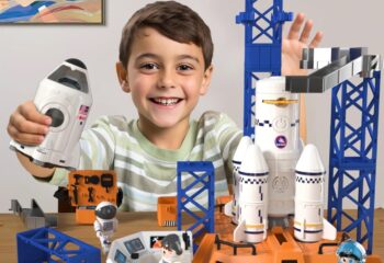 kid with space toys